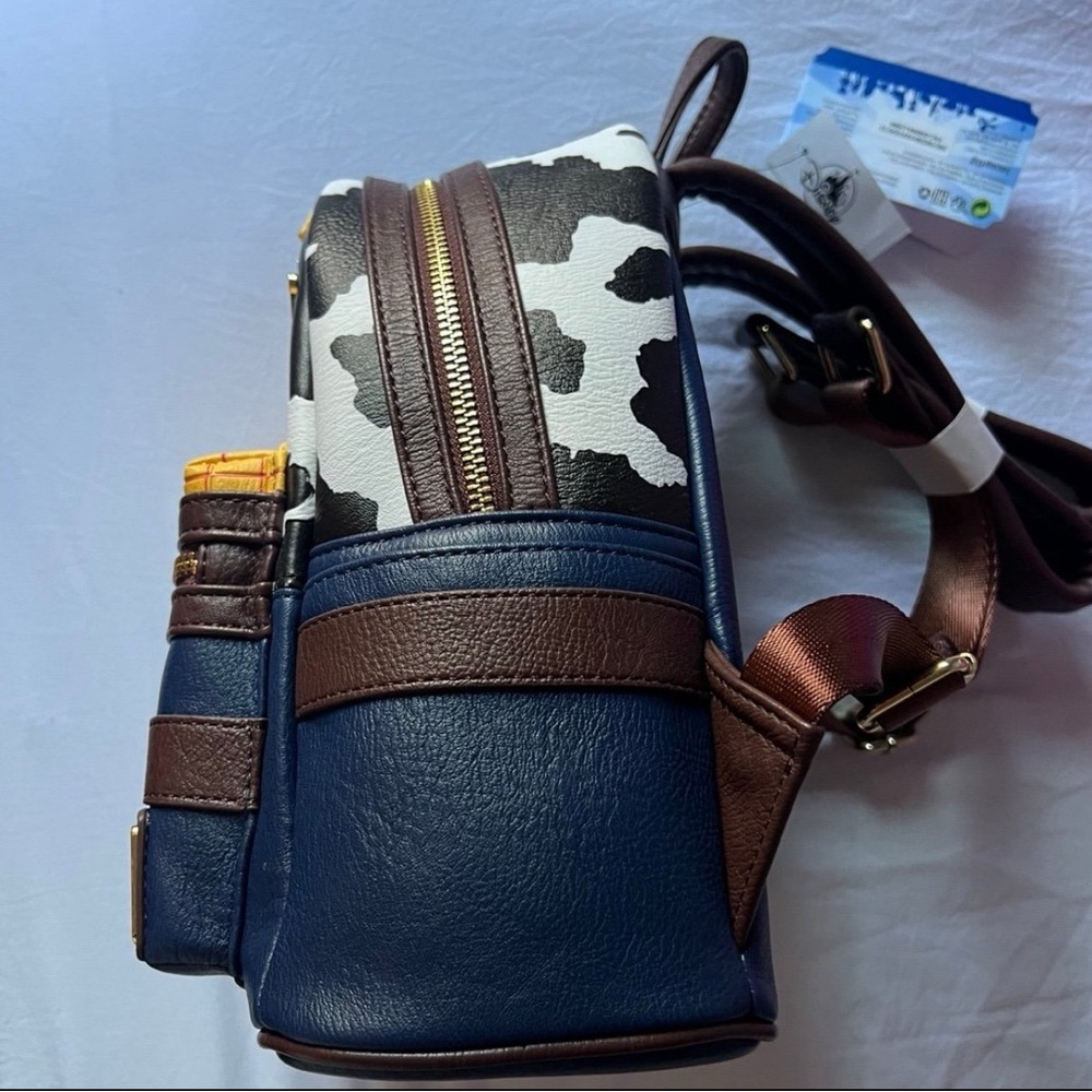 Loungefly Pixar Woody-Inspired Backpack - Red, Yellow, Blue, Brown - Picture 3 of 3